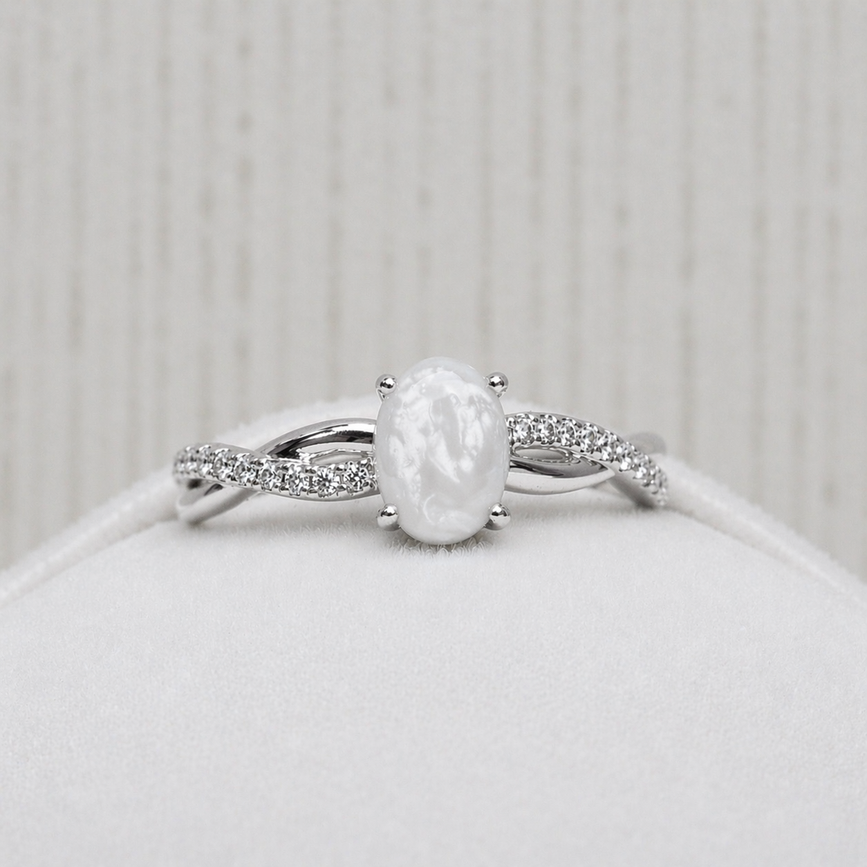 Infinity ring in Silver, pearl stone