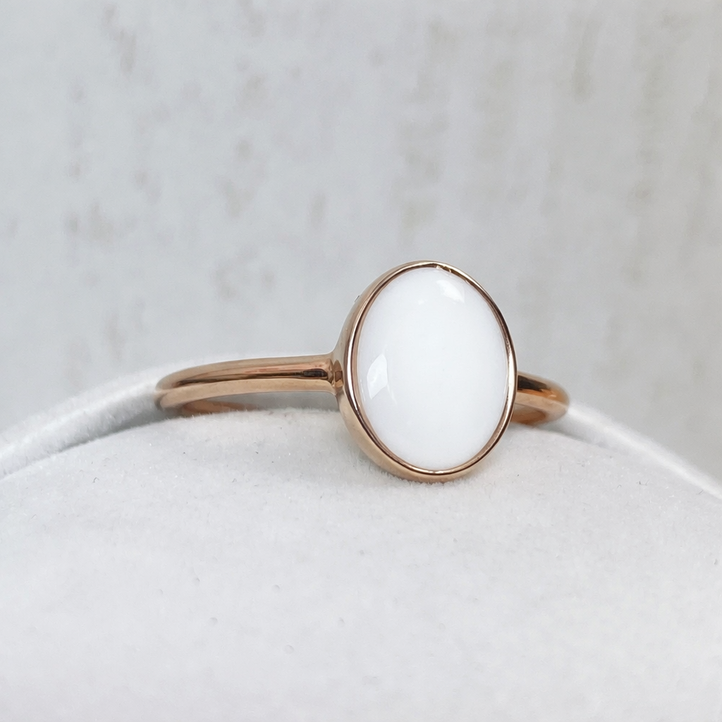 Apodis en vermeil rose, pierre blanche