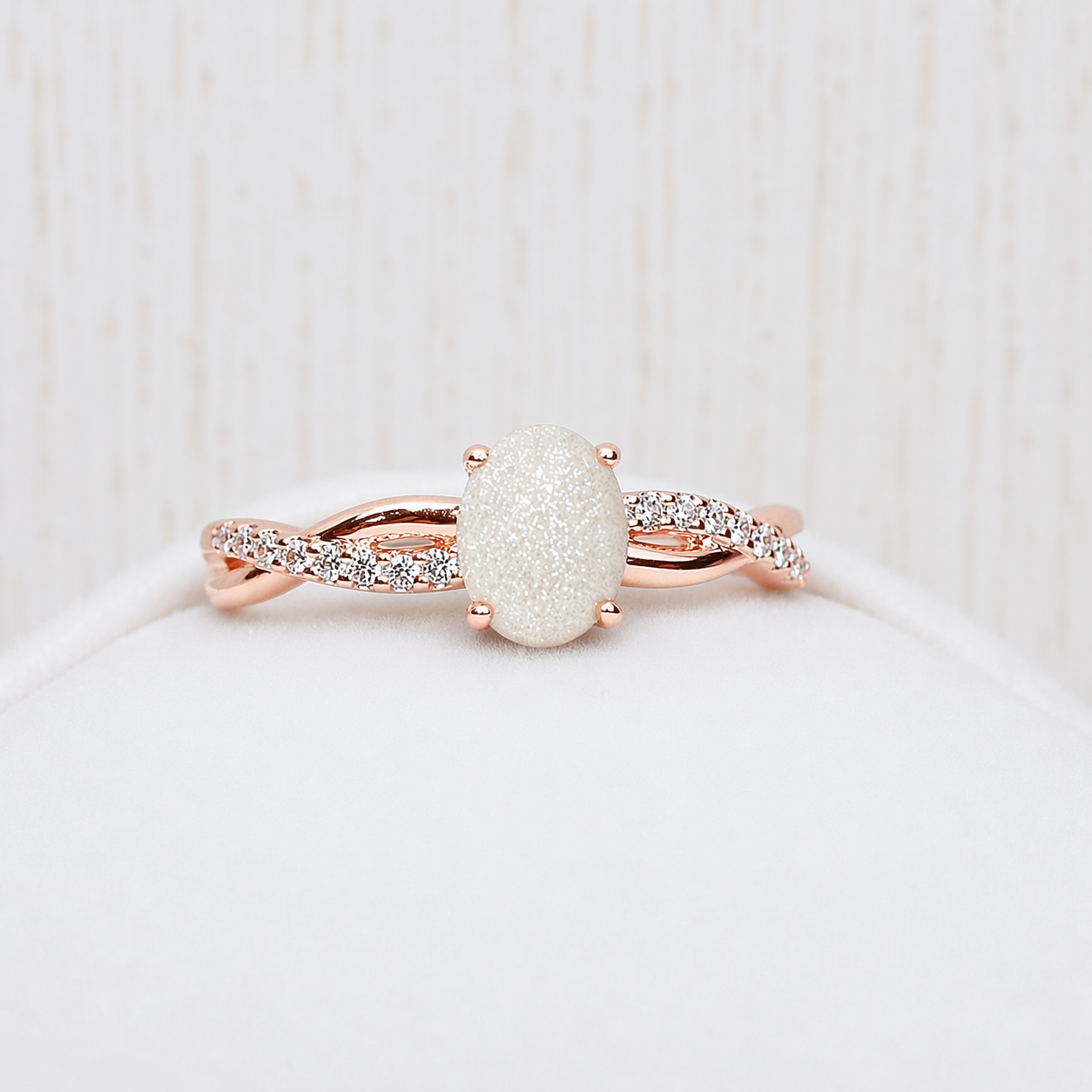 Infinity ring in Rose gold, sparkling stone