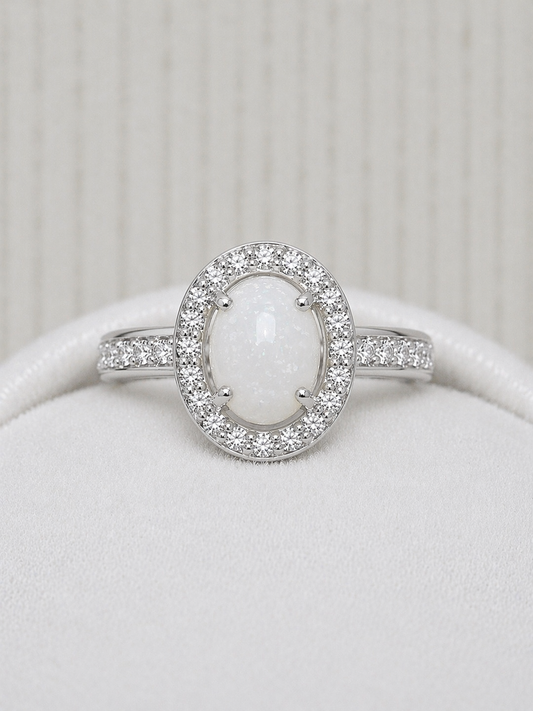 Halo ring in White gold, oval shaped with natural stone