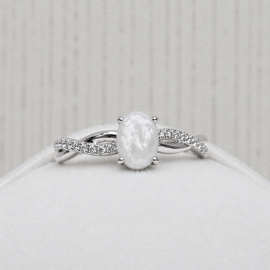 Infinity ring in White gold, pearl stone