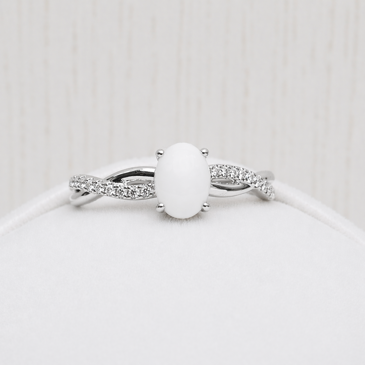 Infinity ring in Silver, white stone